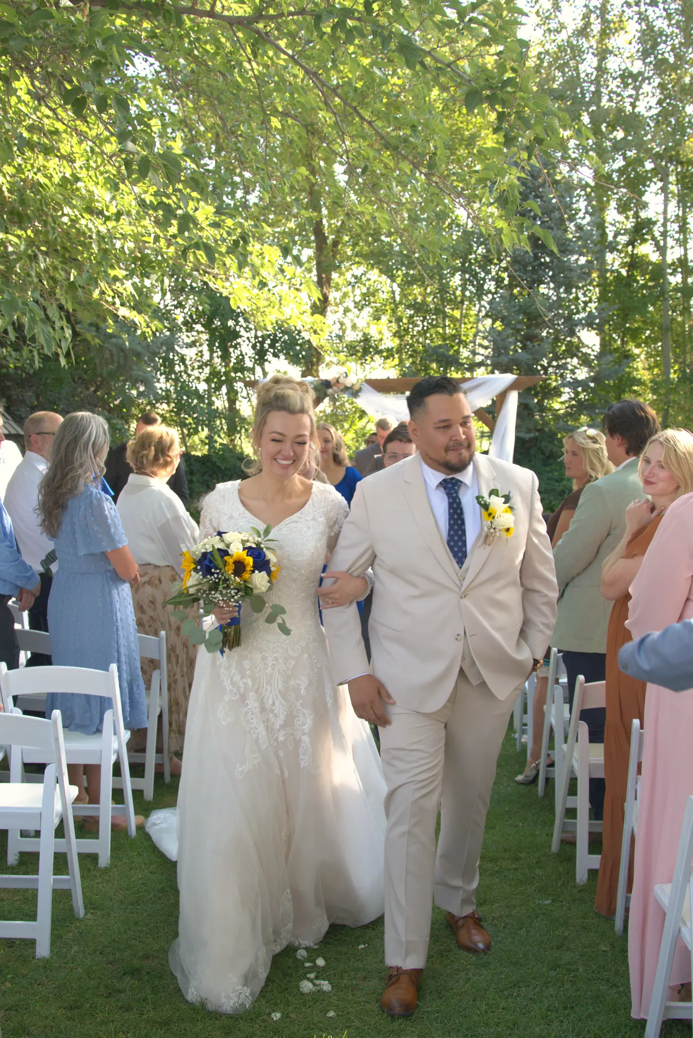 Bride and groom walking down the aisle